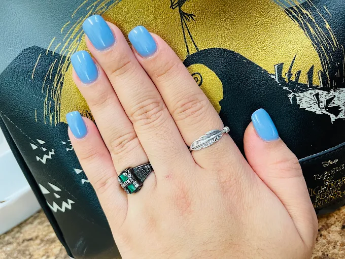 Bright sky-blue rounded nails